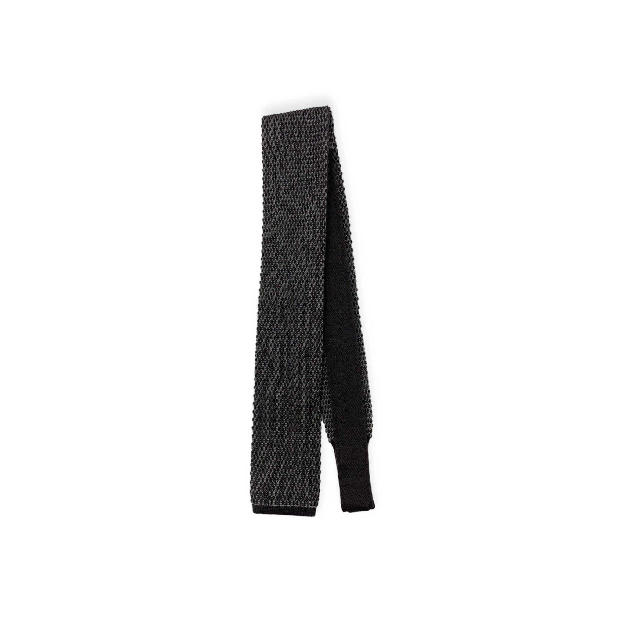 Top down view of back of black Brioni knit tricot tie